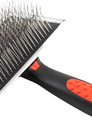 Extra-long pin slicker brush with ergonomic handle removes loose undercoat and tangles for dogs.
